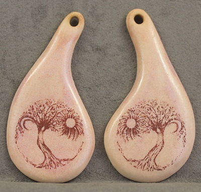 Asymetrical Teardrop with Tree Design